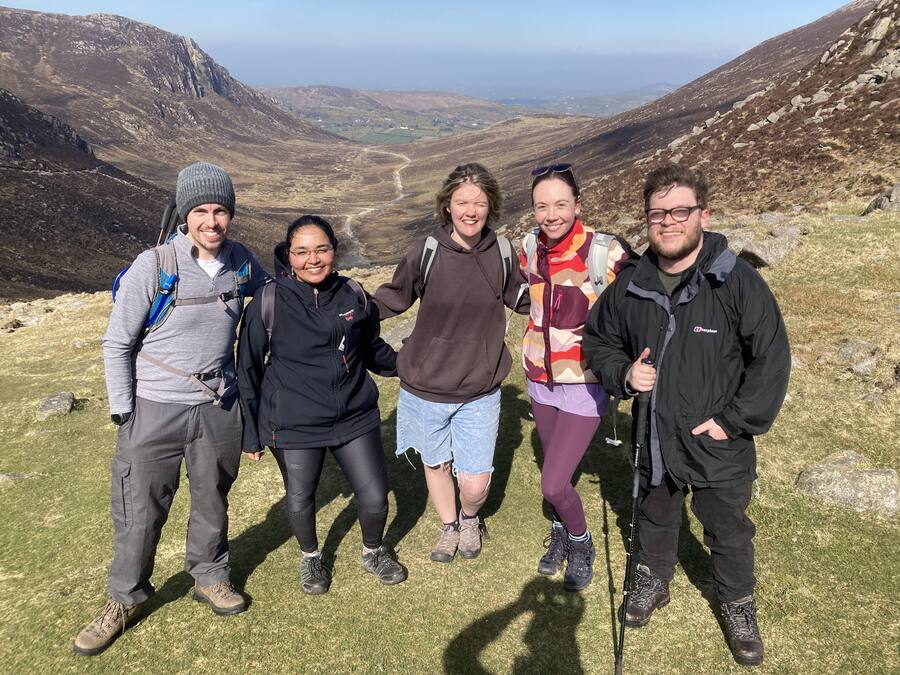 The Courtney Group on a hike in the mountains